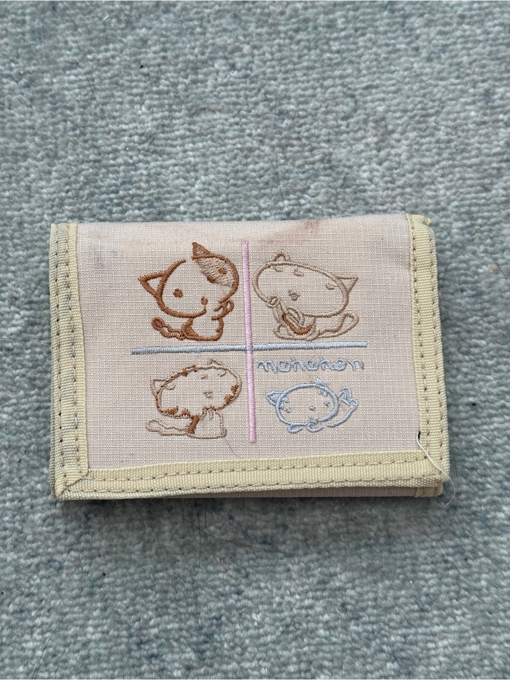 Cat wallet Bought at Sanrio Store
Velcro wallet 
Y2K wallet